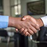 Partnership Business - two people shaking hands