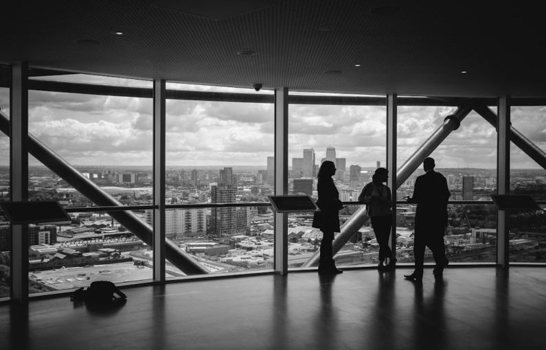 Business Services - people standing inside city building