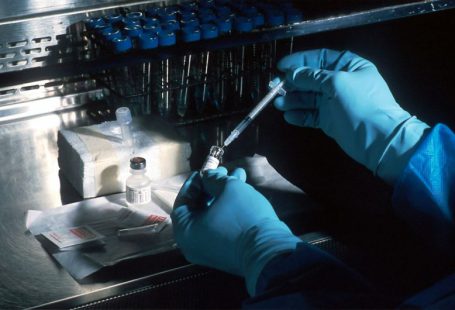 Biotech - person holding silver and black hand tool