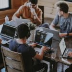 Startups - group of people using laptop computer