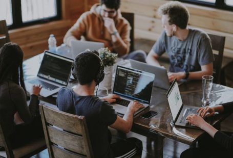 Startups - group of people using laptop computer