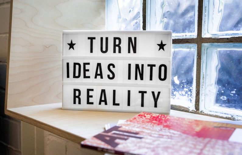 Startups - white and black wooden quote board