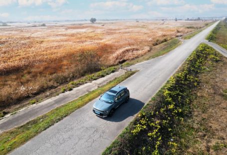Startups Driving - a car driving on a road
