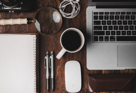 Work - cup of coffee near MacBook Pro