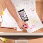 Business Plan - person writing on white paper