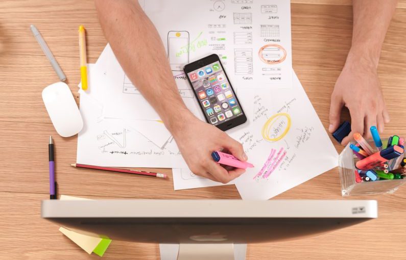 Business Plan - person writing on white paper