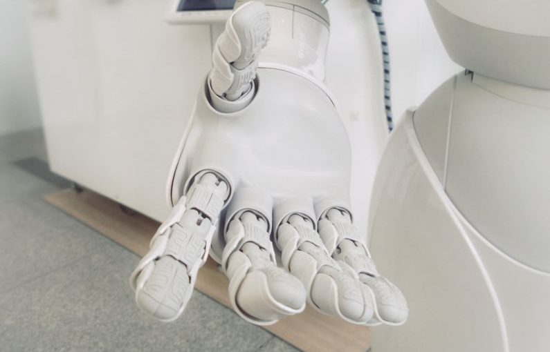 Tech Startups - closeup photo of white robot arm