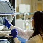 Biotechnology - woman holding test tubes