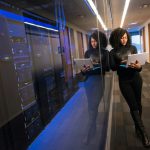 Technological Business - woman in black top using Surface laptop