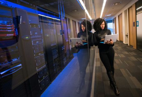 Technological Business - woman in black top using Surface laptop