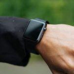 Fashion Tech - person wearing space gray Apple Watch turned off