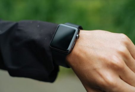 Fashion Tech - person wearing space gray Apple Watch turned off