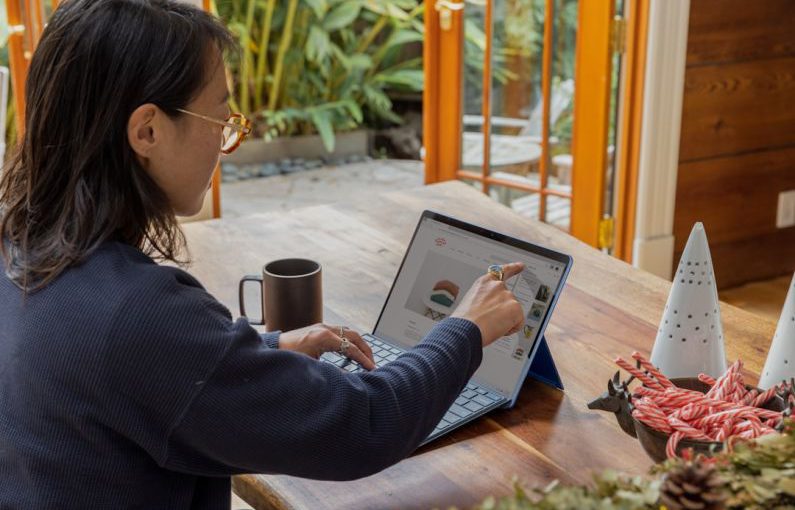 Business - a woman using a laptop