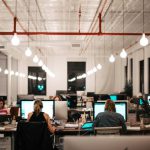 Startups - people sitting on chair in front of computer