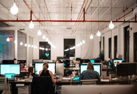 Startups - people sitting on chair in front of computer