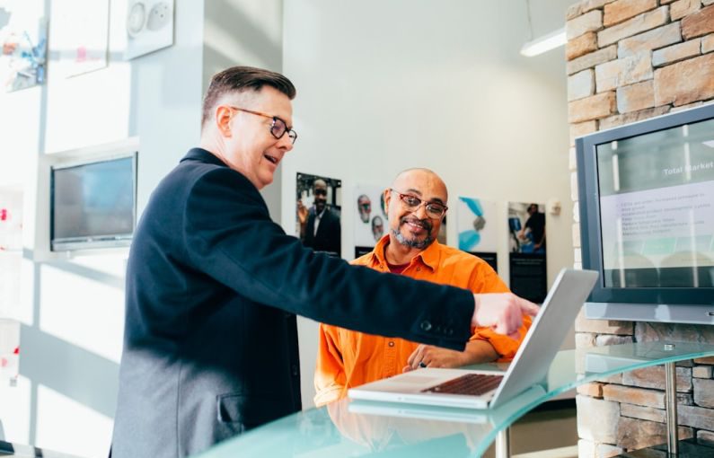 Sales - unknown person using laptop