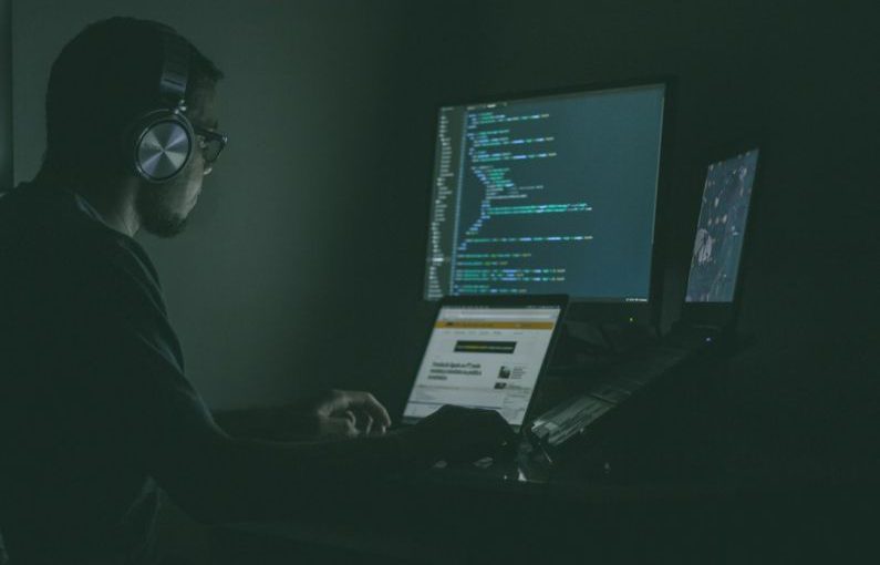 Cybersecurity - person using laptop computers