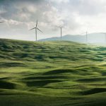 Green Energy - wind turbine surrounded by grass