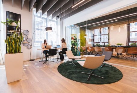Coworking - woman in black shirt sitting on brown chair