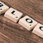Social Media Engagement - Blog Letters on Brown Wood