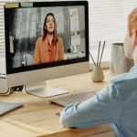 Online Education - Photo of Child Sitting by the Table While Looking at the Imac