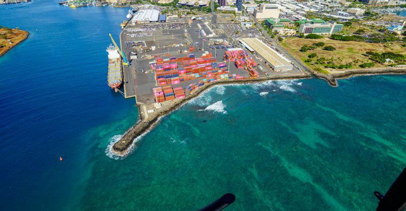 Logistics Startup - An aerial view of a harbor with a large ship