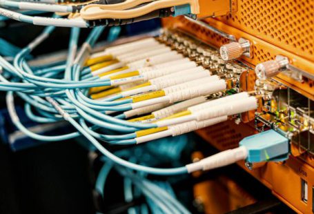 Tech Hub - Modern hardware and structured cabling system with patch cords inserted into patch panel outlets