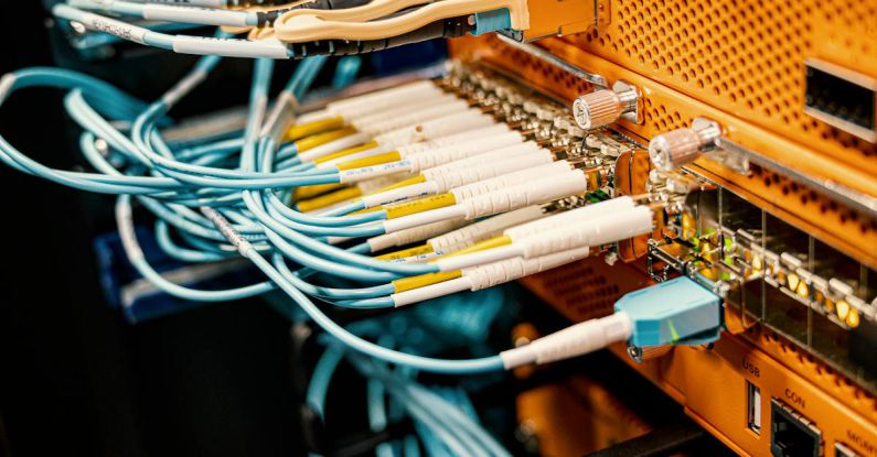 Tech Hub - Modern hardware and structured cabling system with patch cords inserted into patch panel outlets