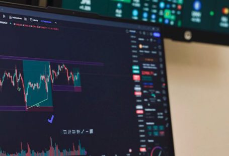 Investment Graph - A laptop with a screen displaying a chart