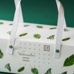 Green Packaging - White and Green Floral Print Textile