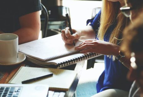 Startup Advice - Person Writing on the Notebook