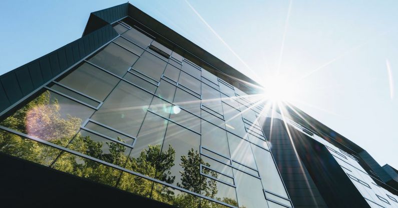 Green Business - Low-angle Photography of High-rise Building